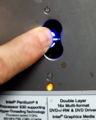 The power button is being heavily used for resuscitation of Scampo these days.  (The coffee splashes are not recent.)